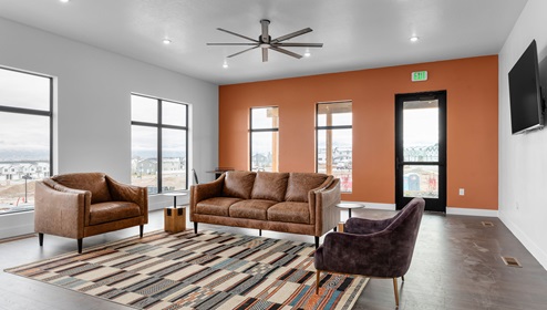 Little Valley Gateway community clubhouse main area for entertaining with large television on the wall.