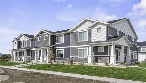 Townhome exterior with landscaping in Osprey Townhomes in Provo Utah.