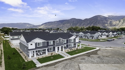 Aerial view of townhome exteriors with landscaping in Provo Utah.