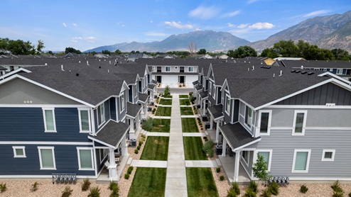 Aerial view of townhome exteriors with landscaping in Provo Utah.