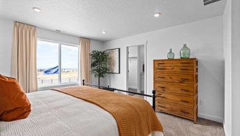 Townhomes with spacious Primary bedrooms with ensuite full size bathrooms shown and available in Tooele Utah.