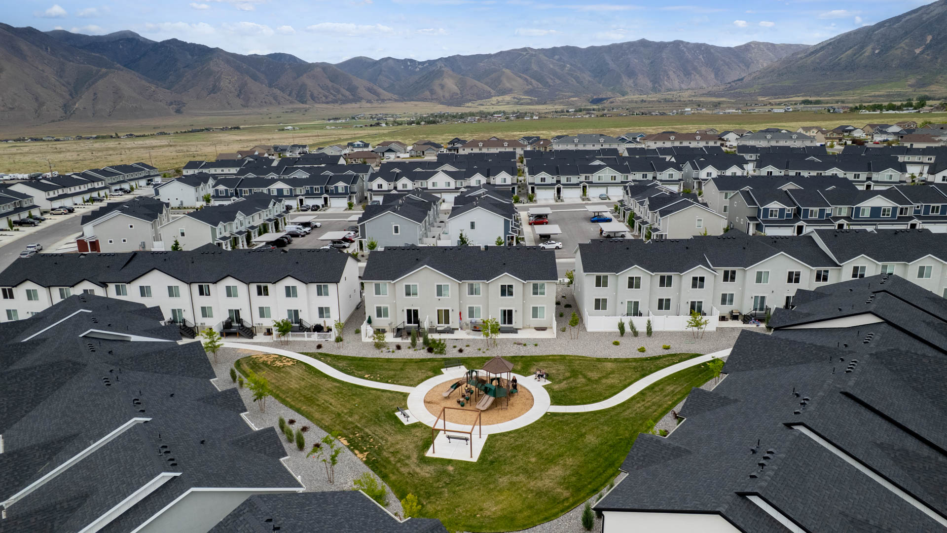 Aerial photo of D.R. Horton’s Western Acres playground area  townhome community in Tooele Utah.