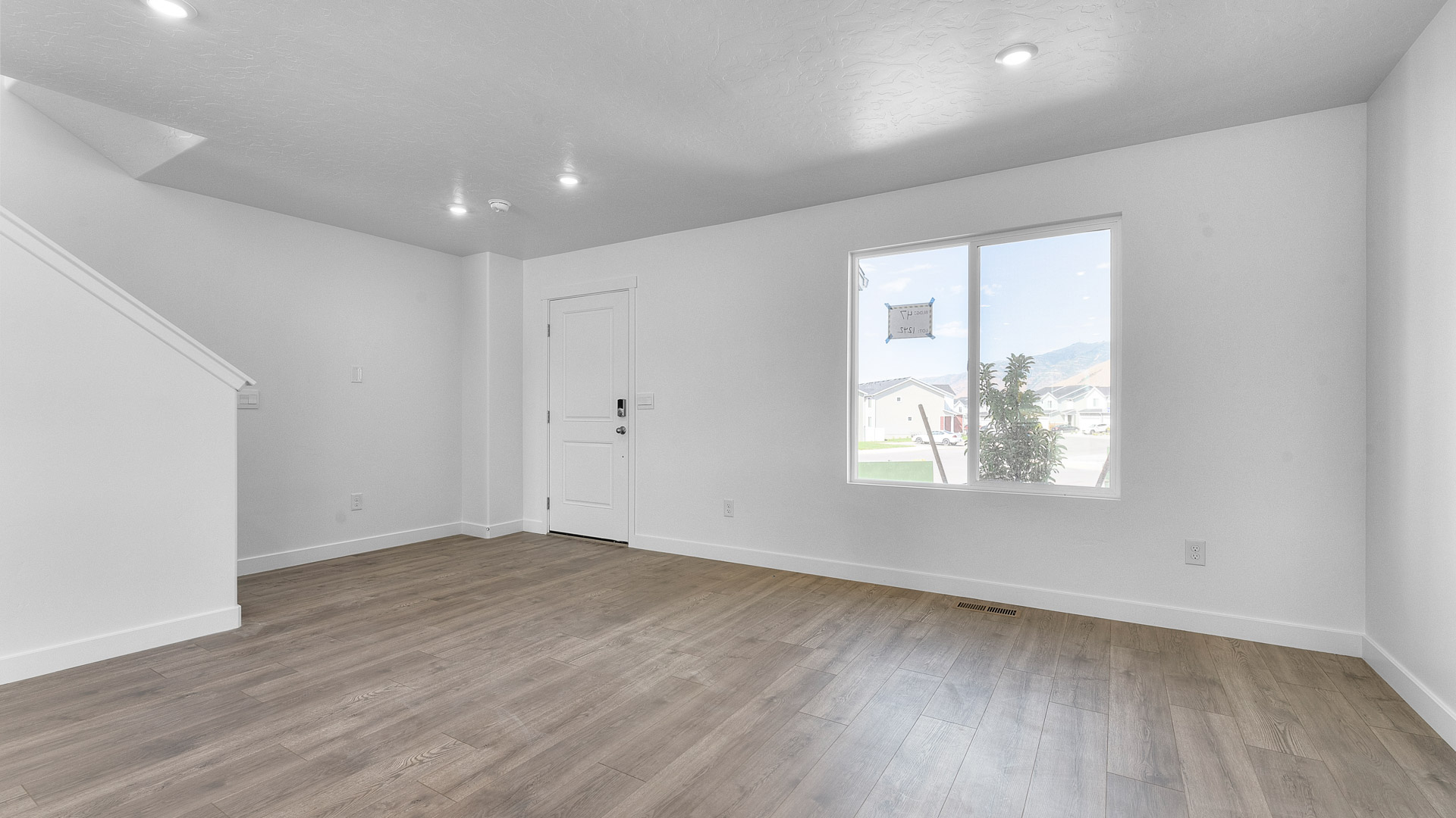 Main living space family room and entrance.