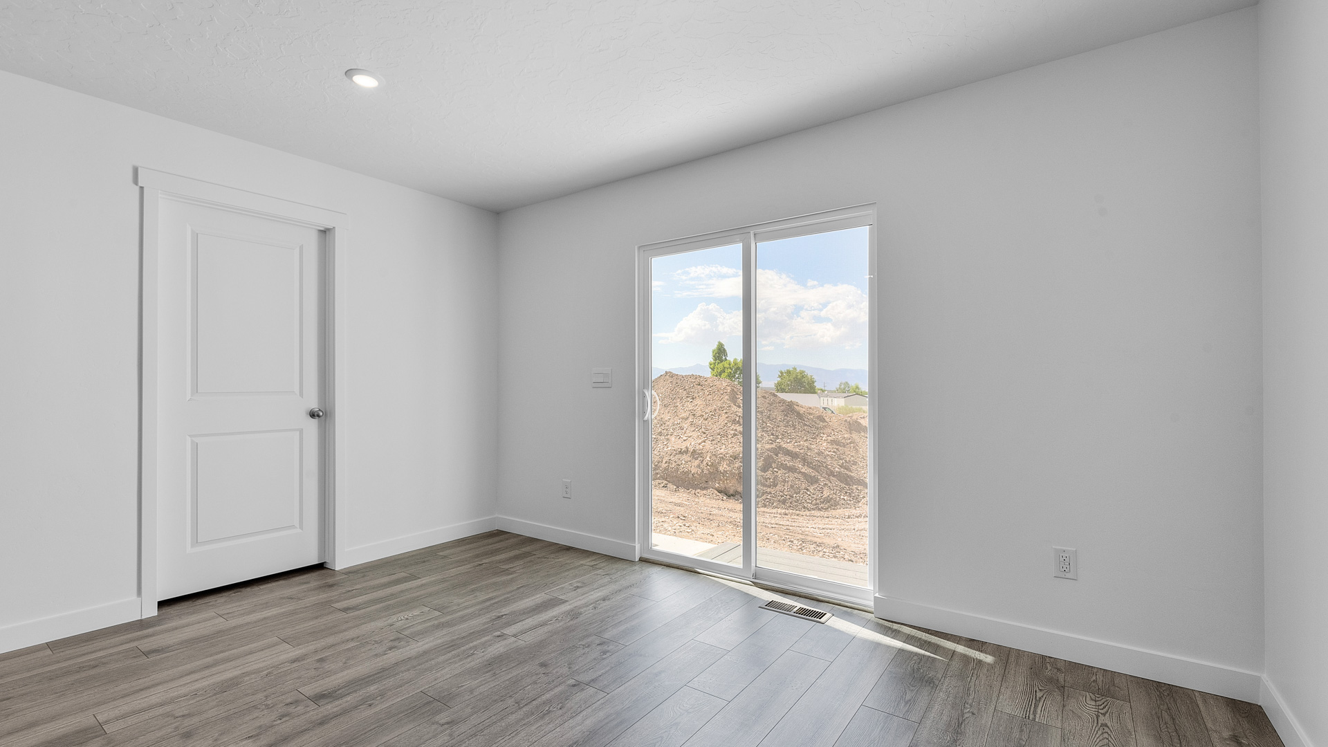 Dining room with glass sliding doors.