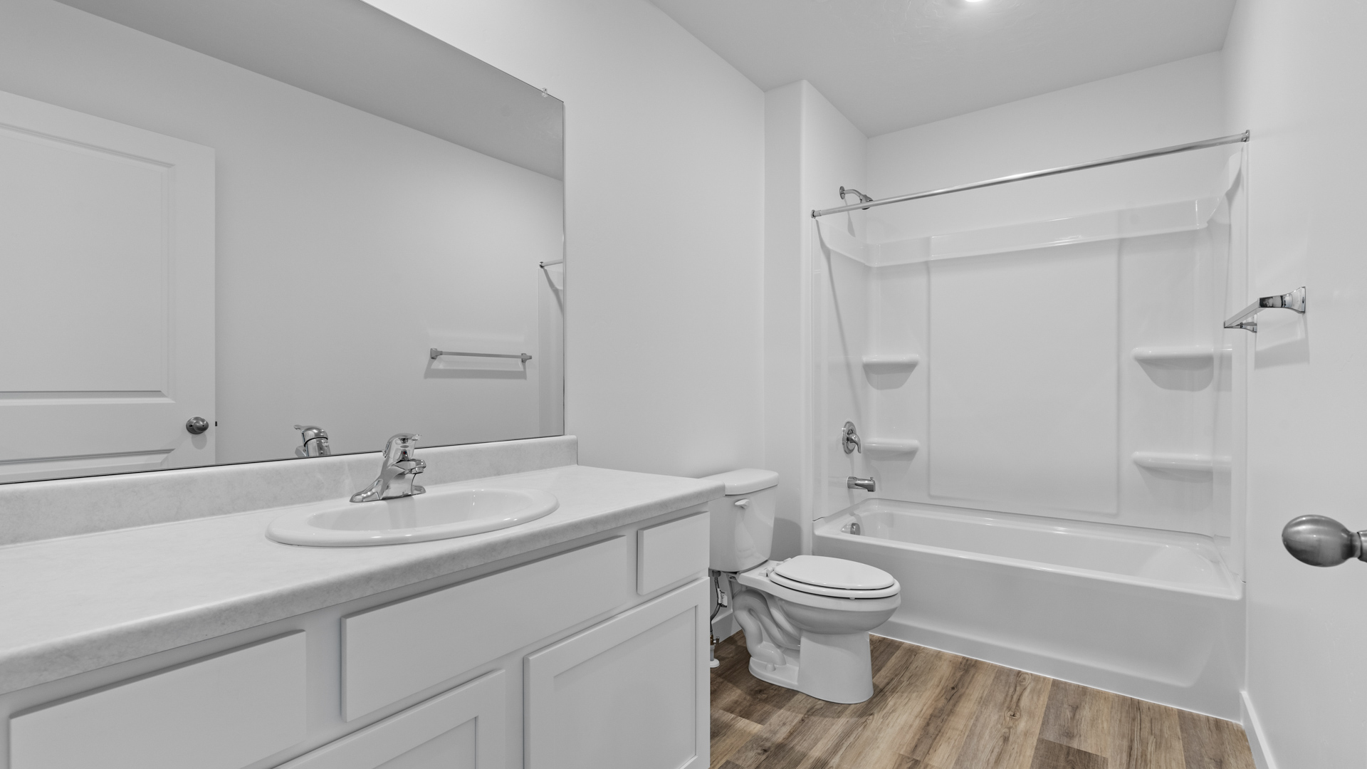 Upstairs bathroom with shower surround.