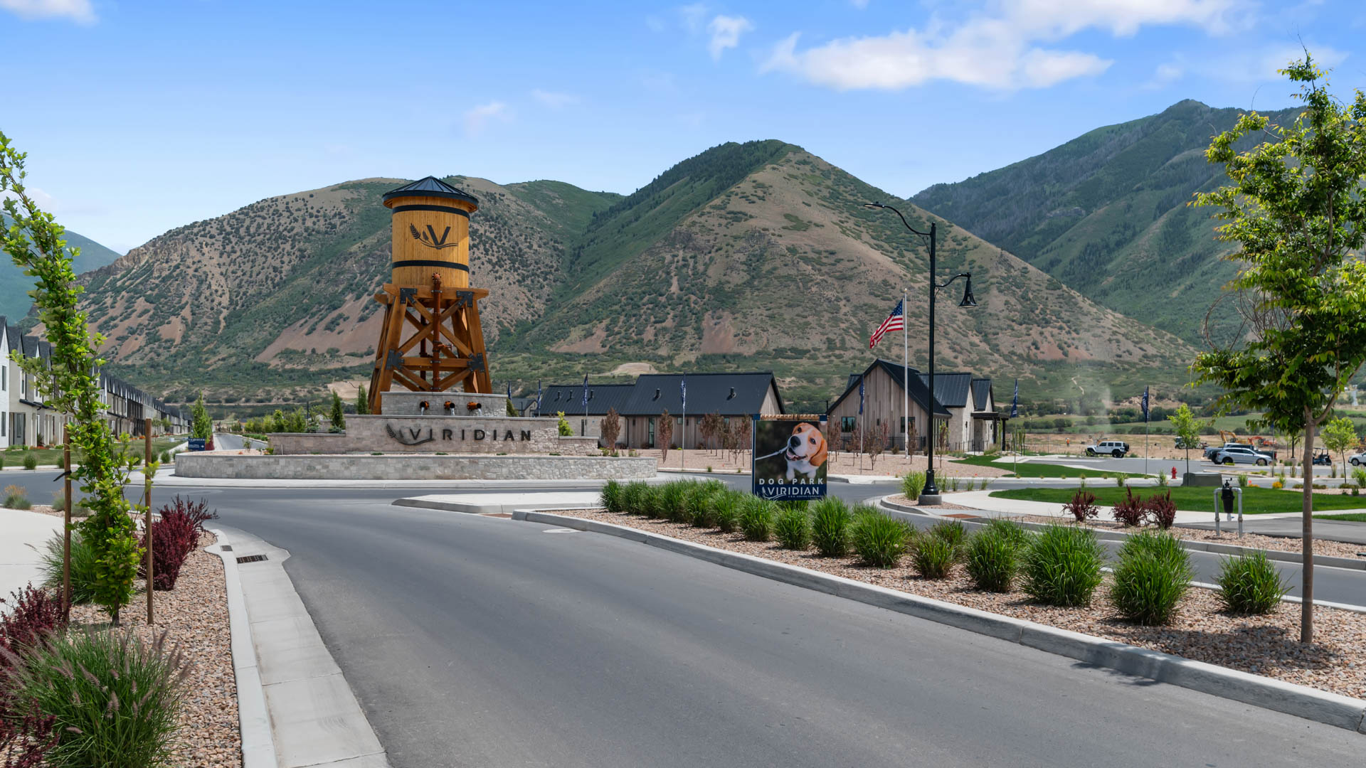 Viridian community aerial showcasing homes being built and mountains.