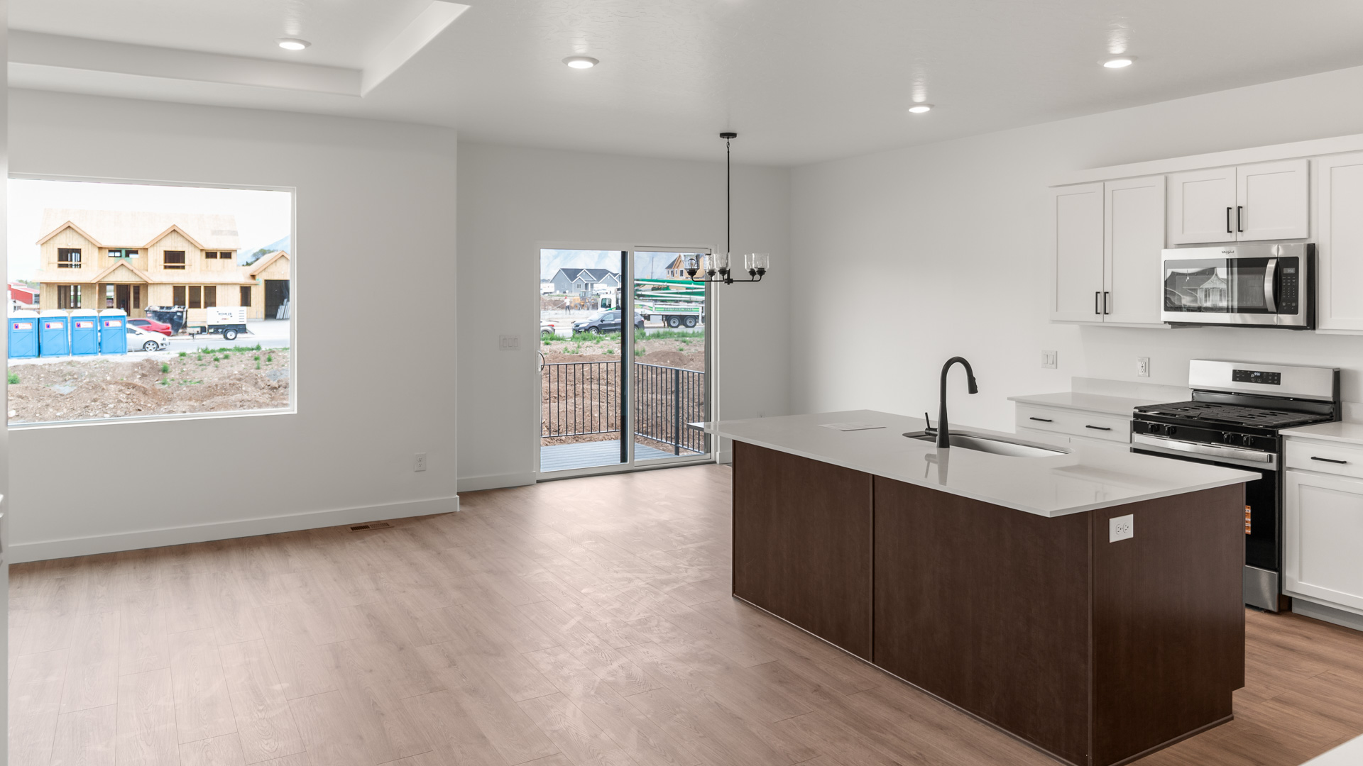 Main living space with kitchen, family room, and dining.