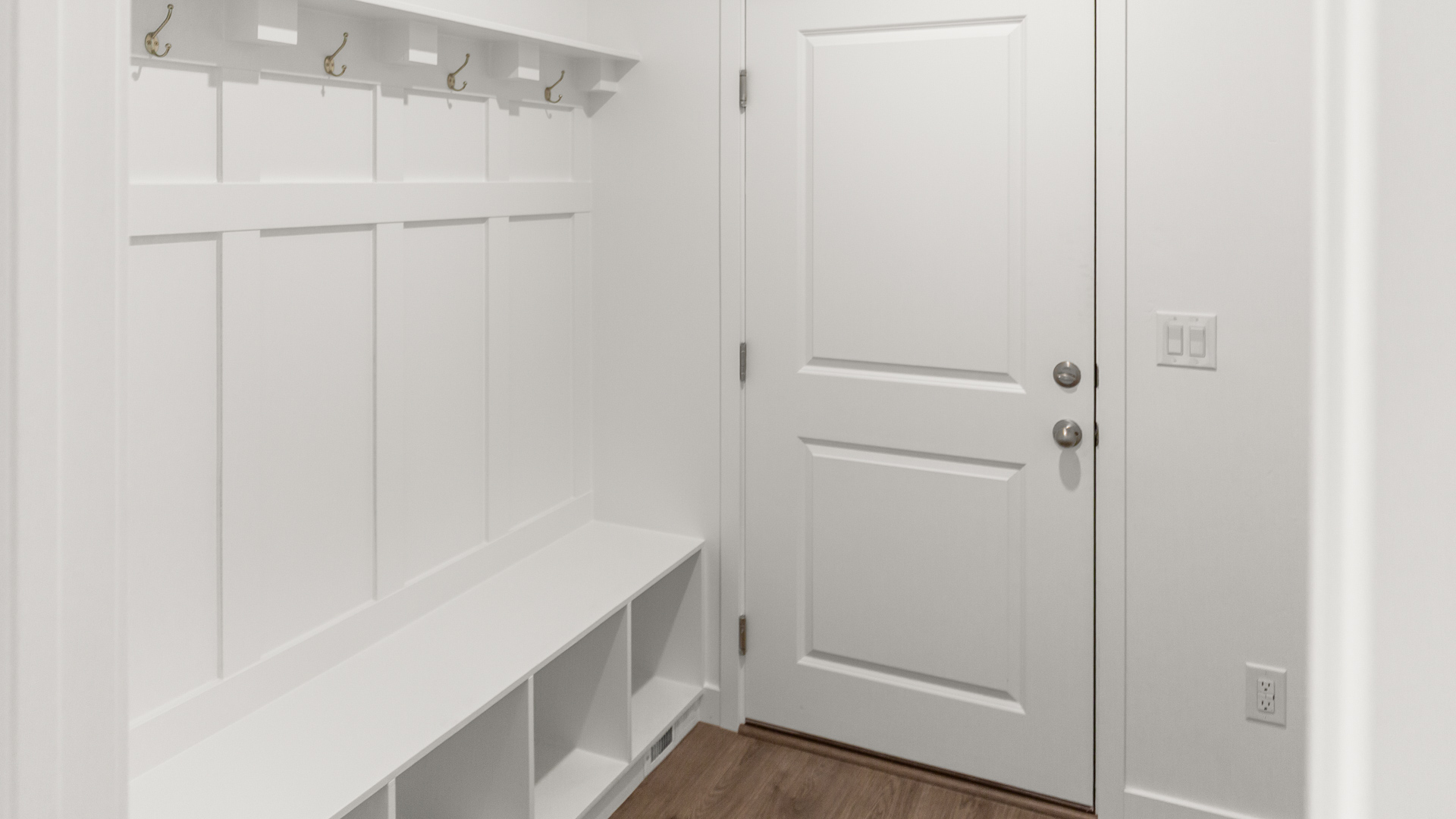 Laundry room with mudroom bench.