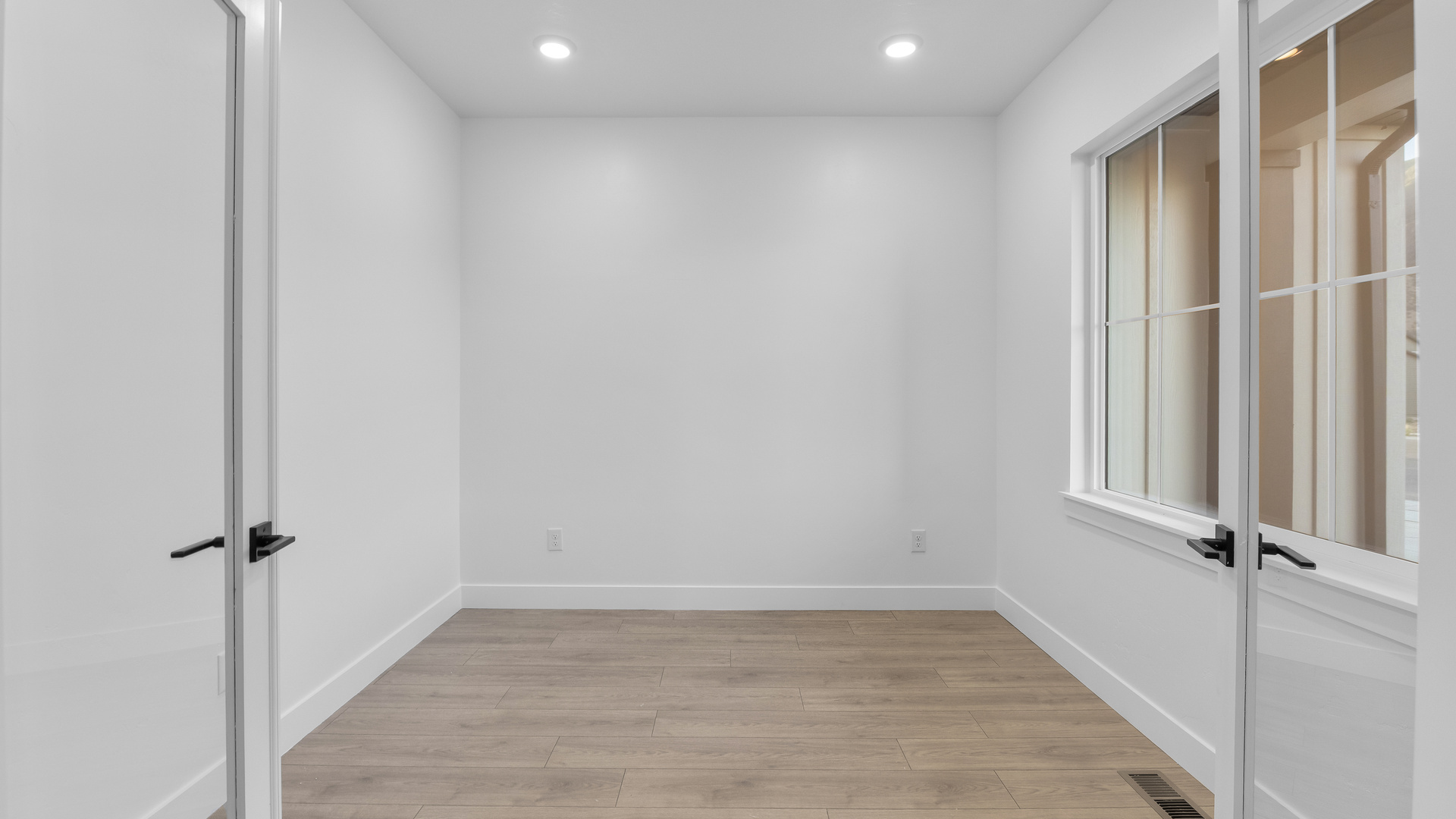 Office room with double doors in hallway