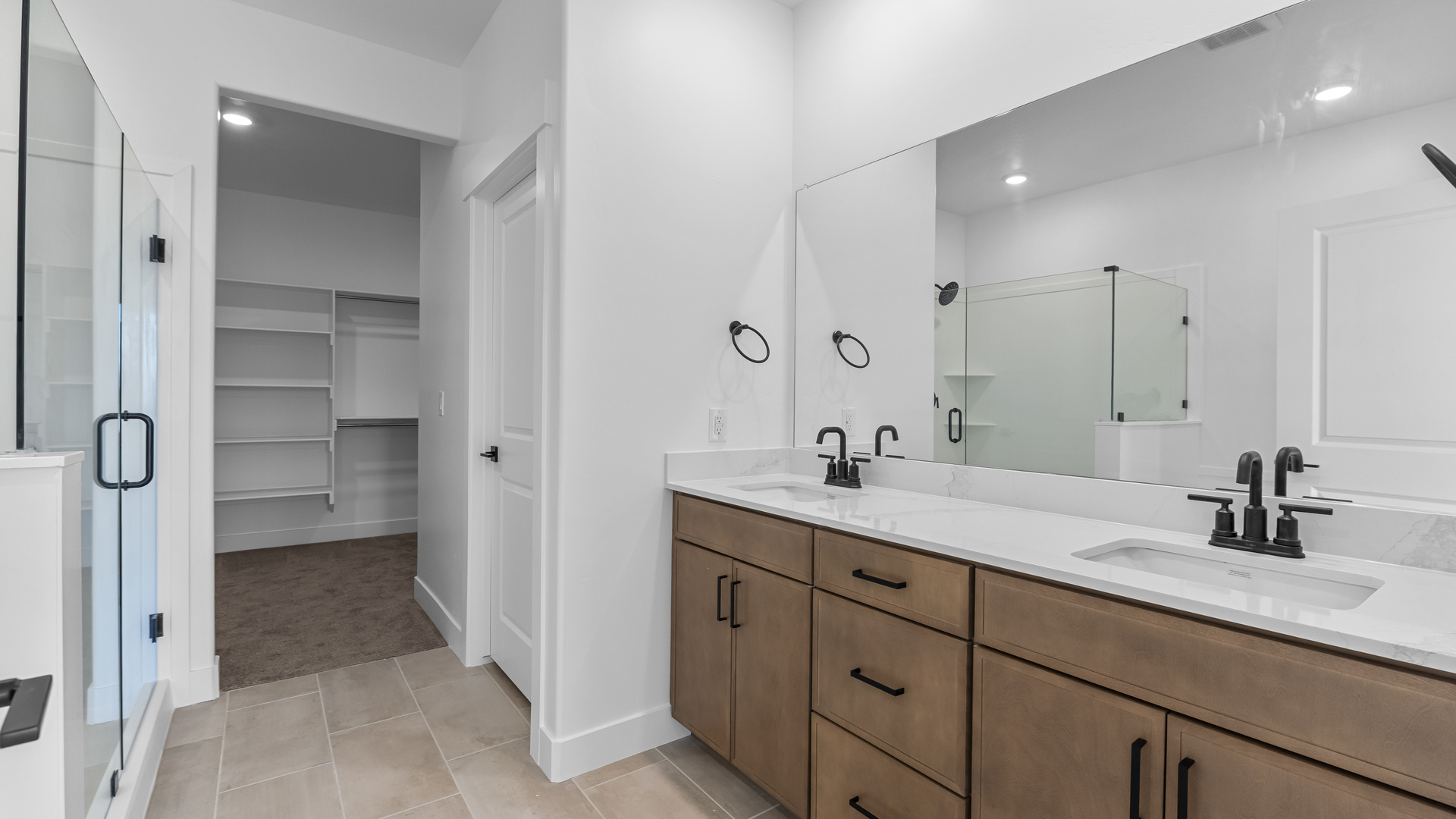 Bathrooms with vanity and shower surround