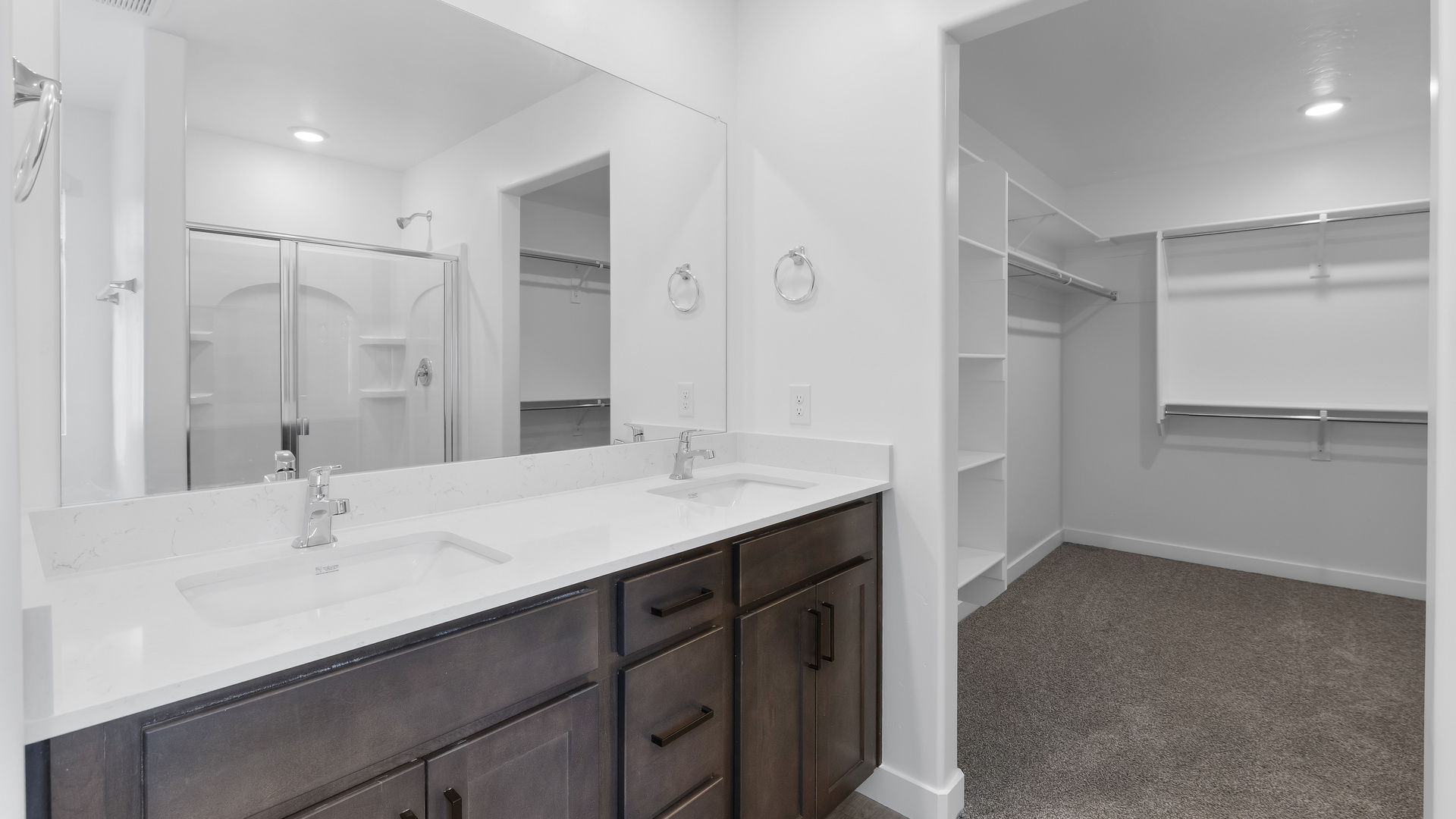 Primary bathroom with double sink vanity.