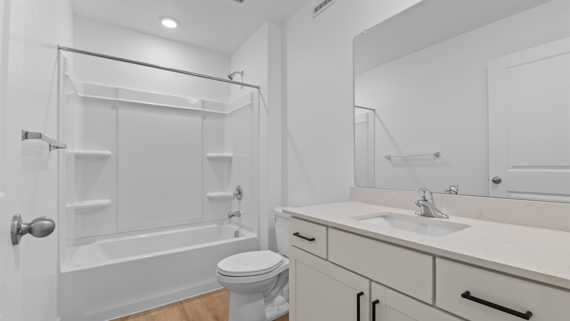 Bathroom with shower surround.