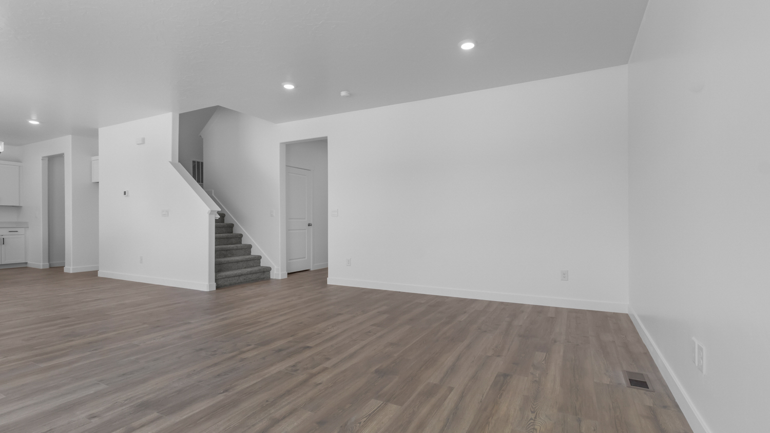 Family room wit large window.