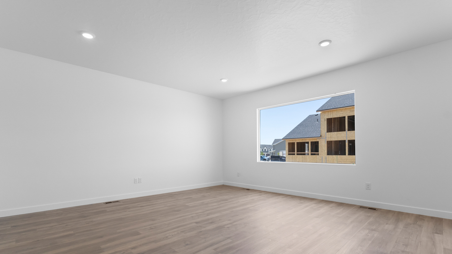 Family room wit large window.