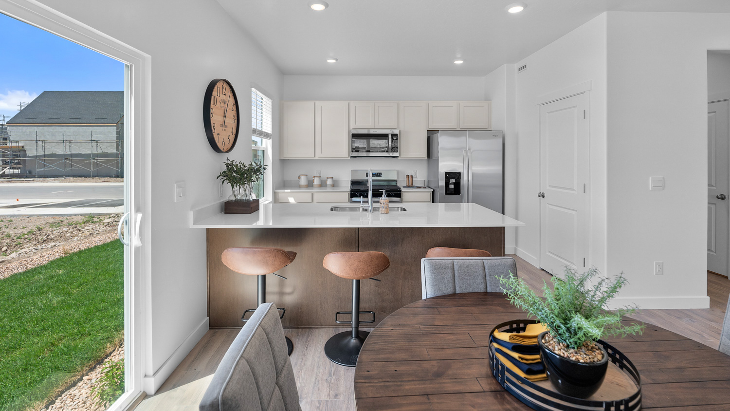 Kitchen area with patio doors and kitchen island.