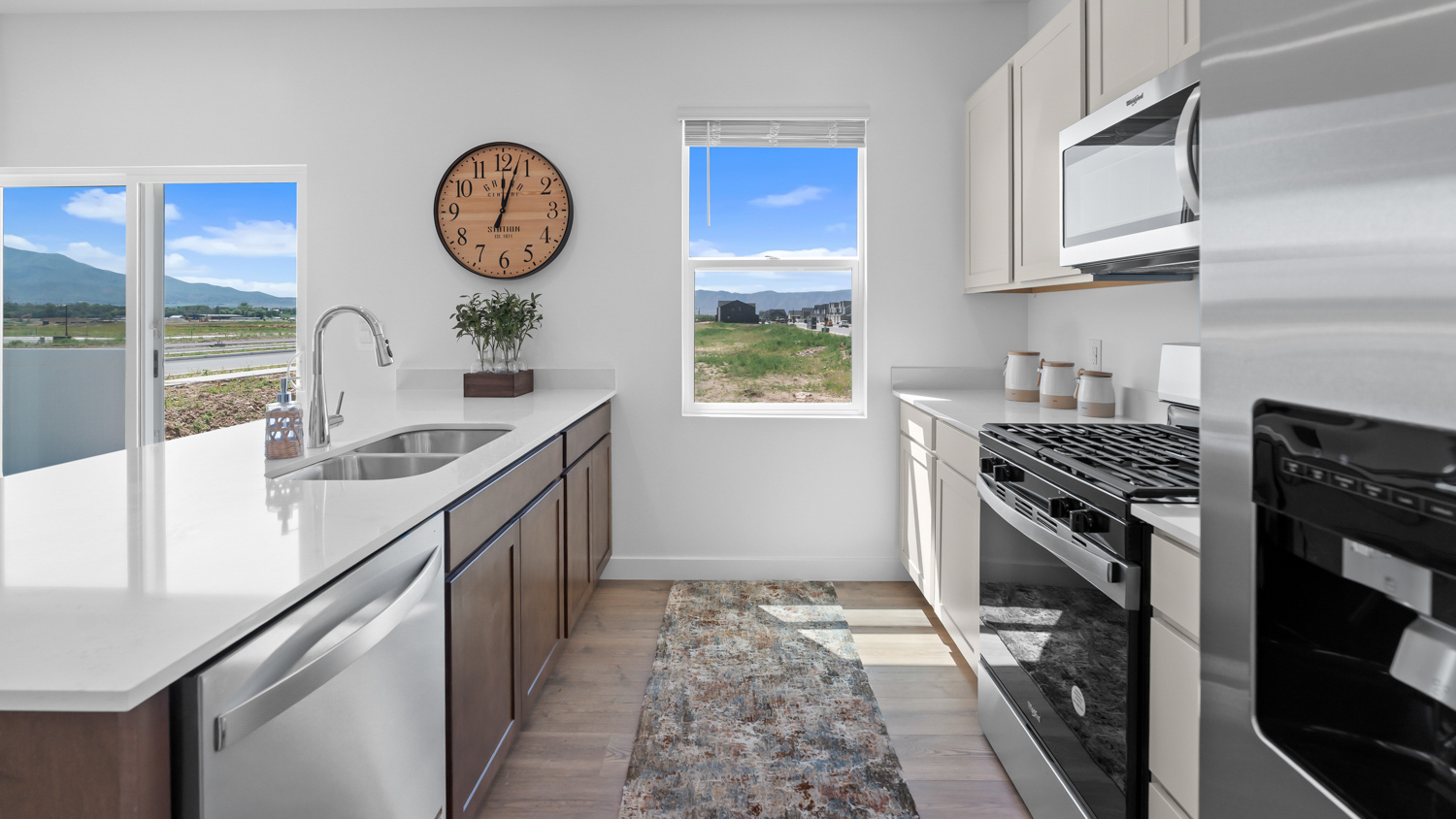 Kitchen area with patio doors and kitchen island.