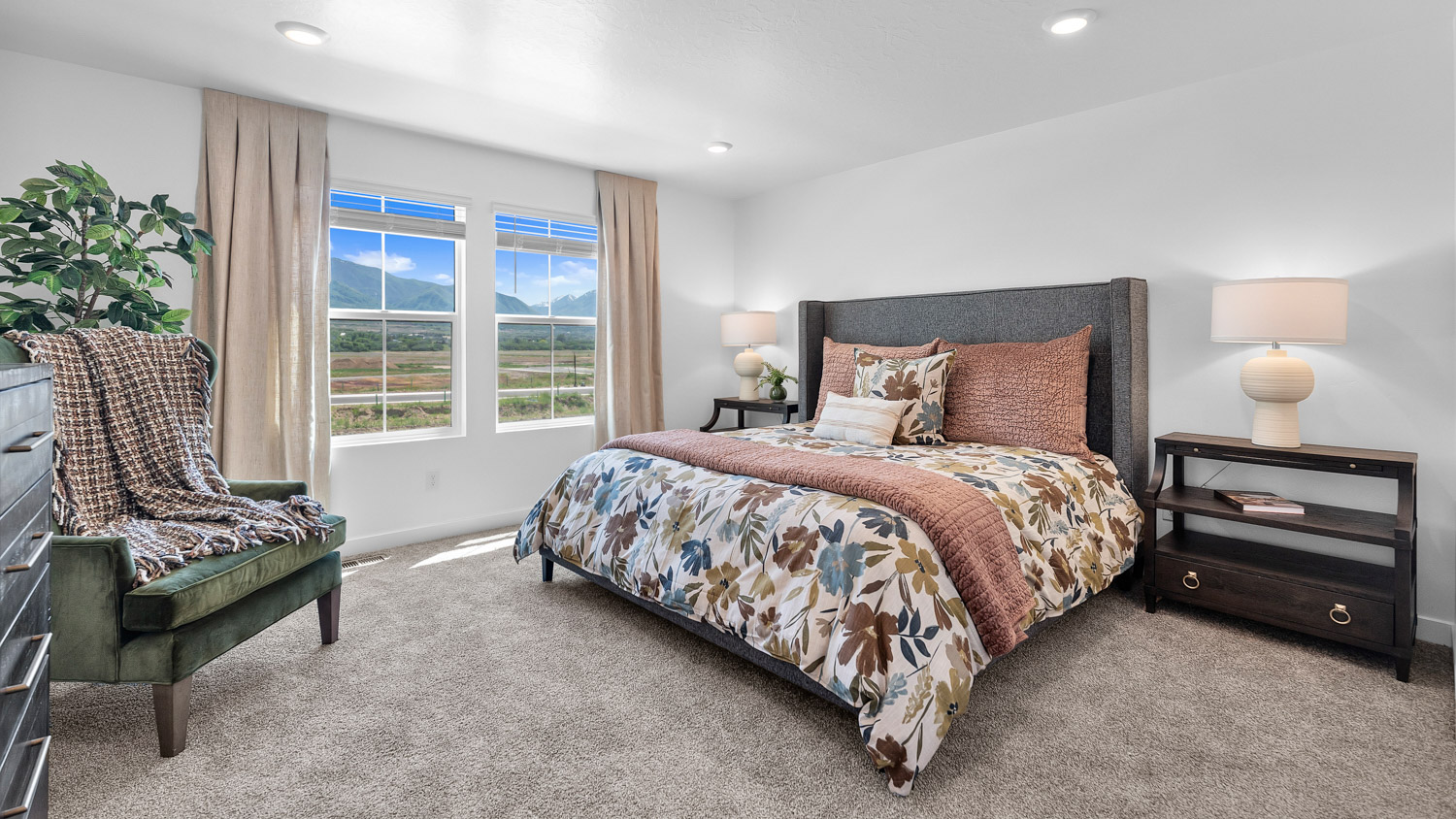 Primary bedroom with large window.
