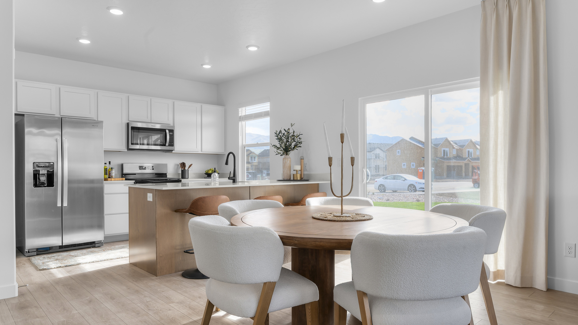 Kitchen area with patio doors and kitchen island.