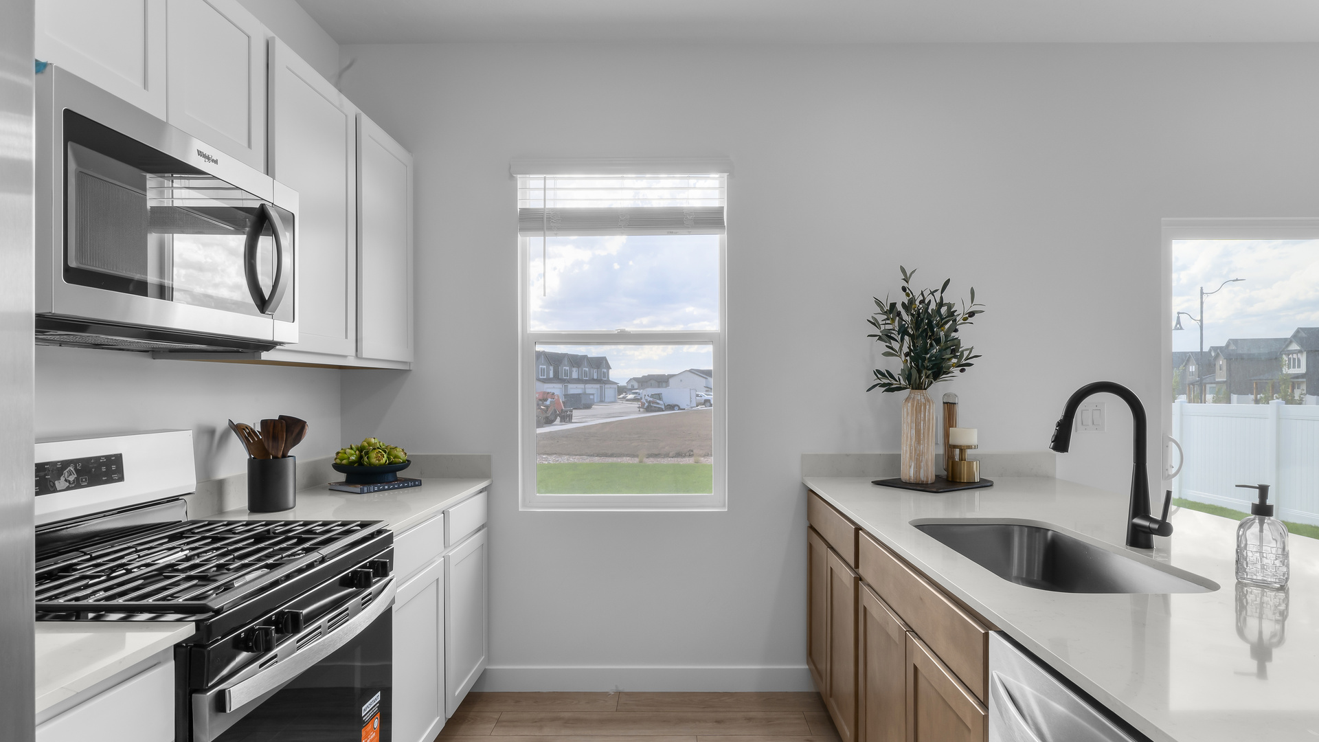 Kitchen area with patio doors and kitchen island.
