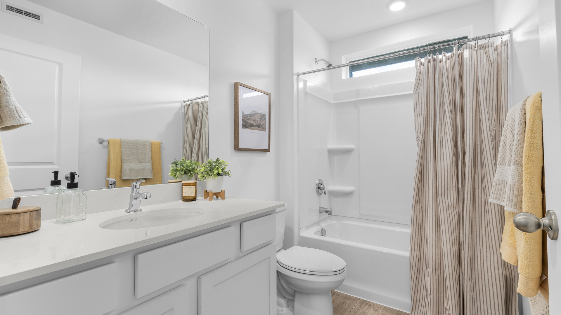 Bathroom with shower surround.