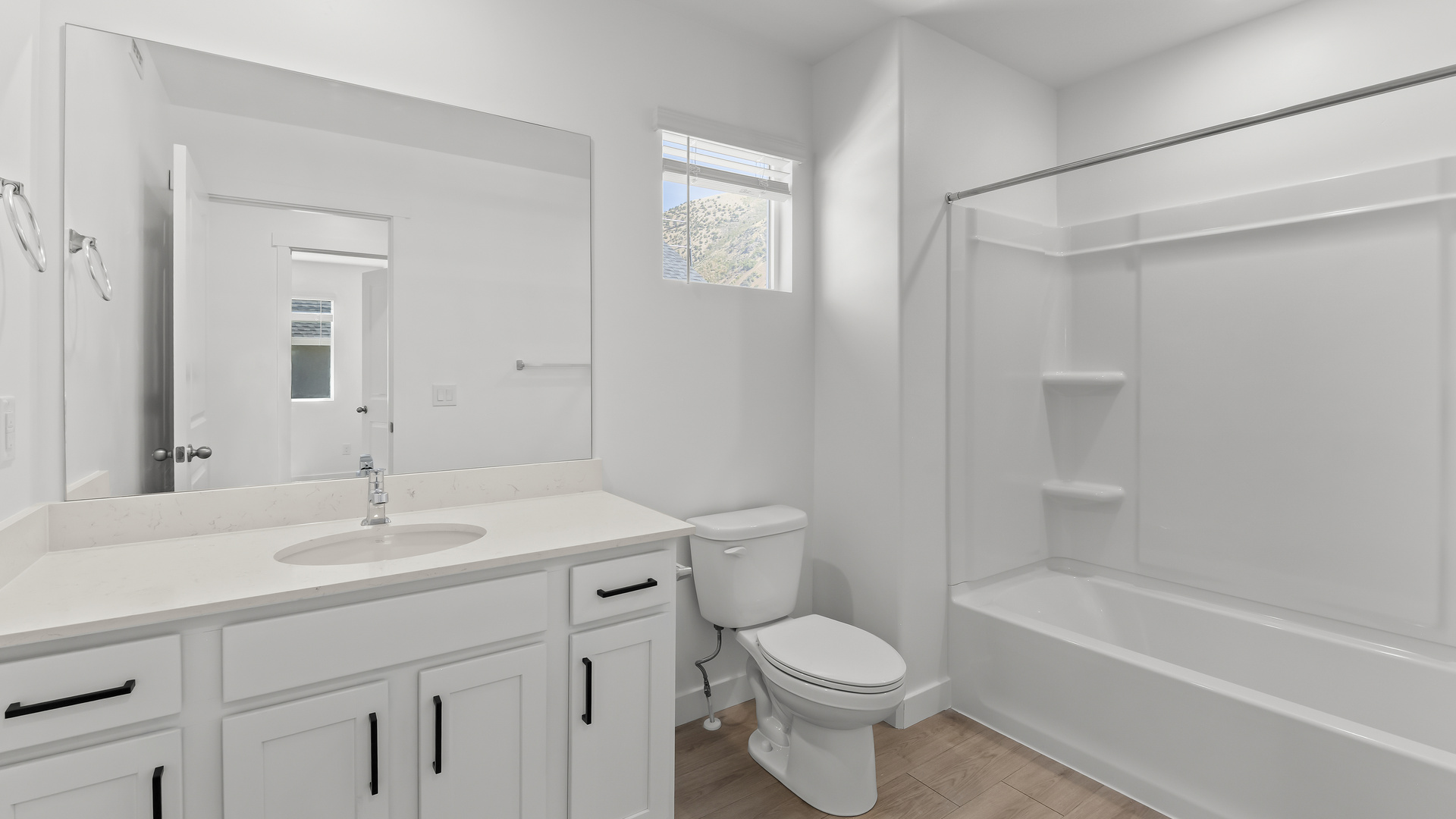 Bathroom with shower surround.