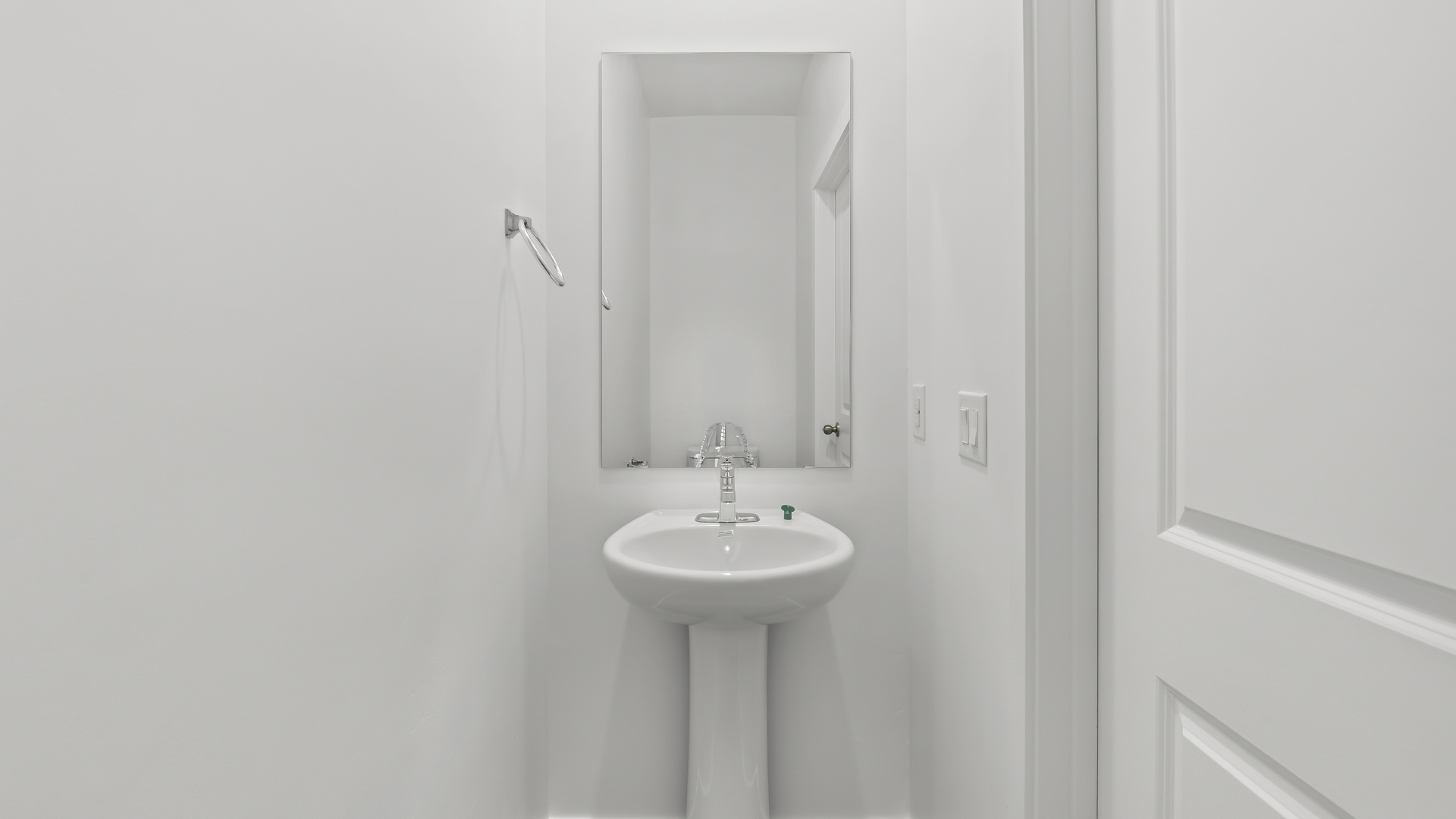 Powder bath with pedestal sink.