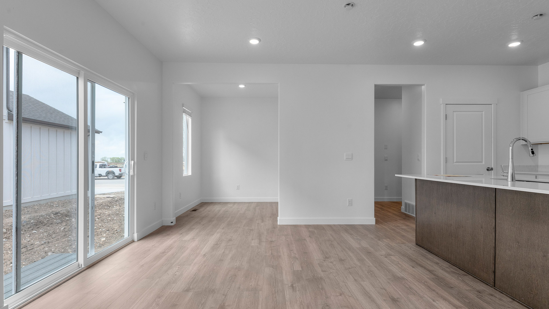 Kitchen and dining with patio doors.