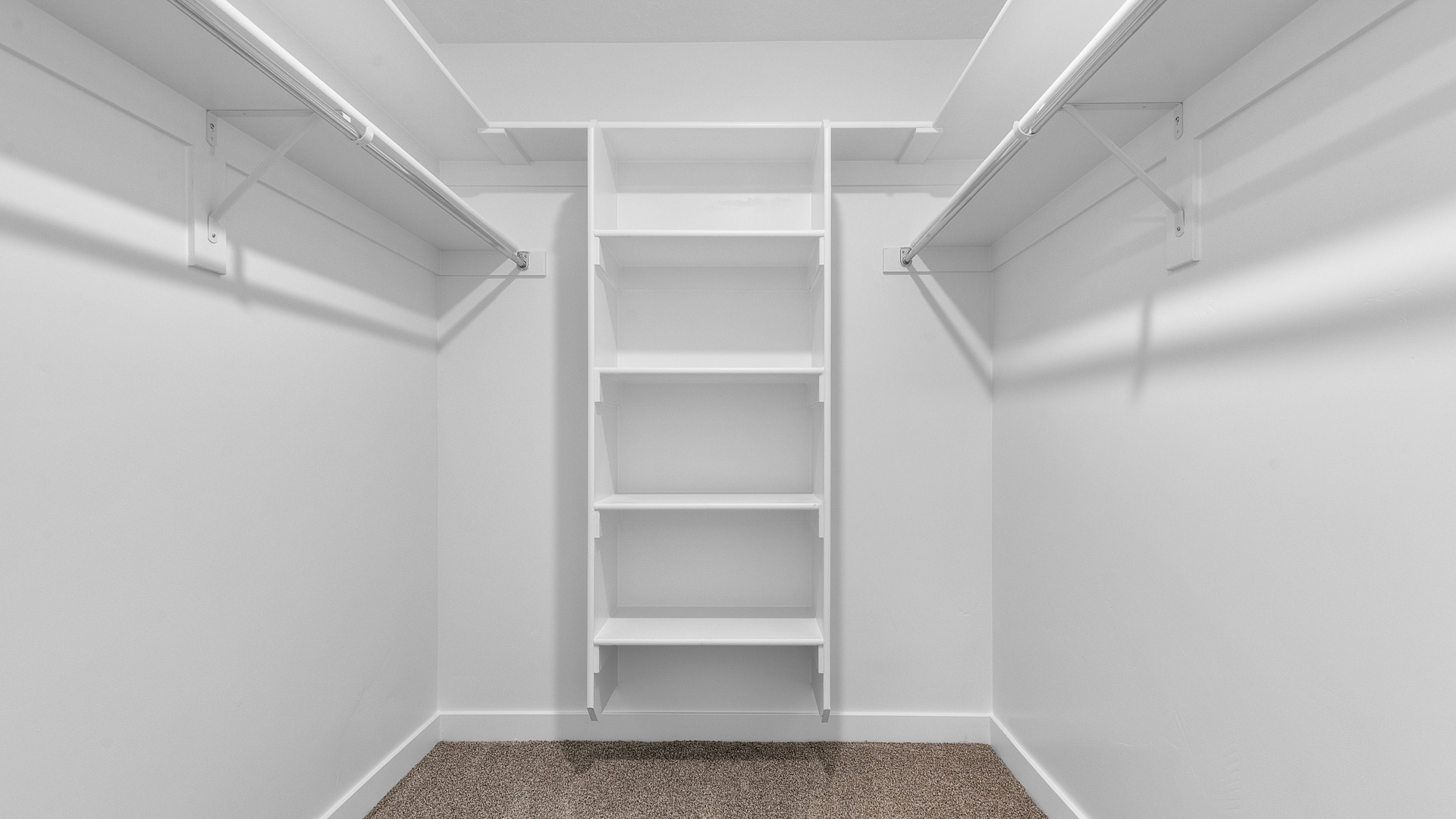 Primary walk-in closet.