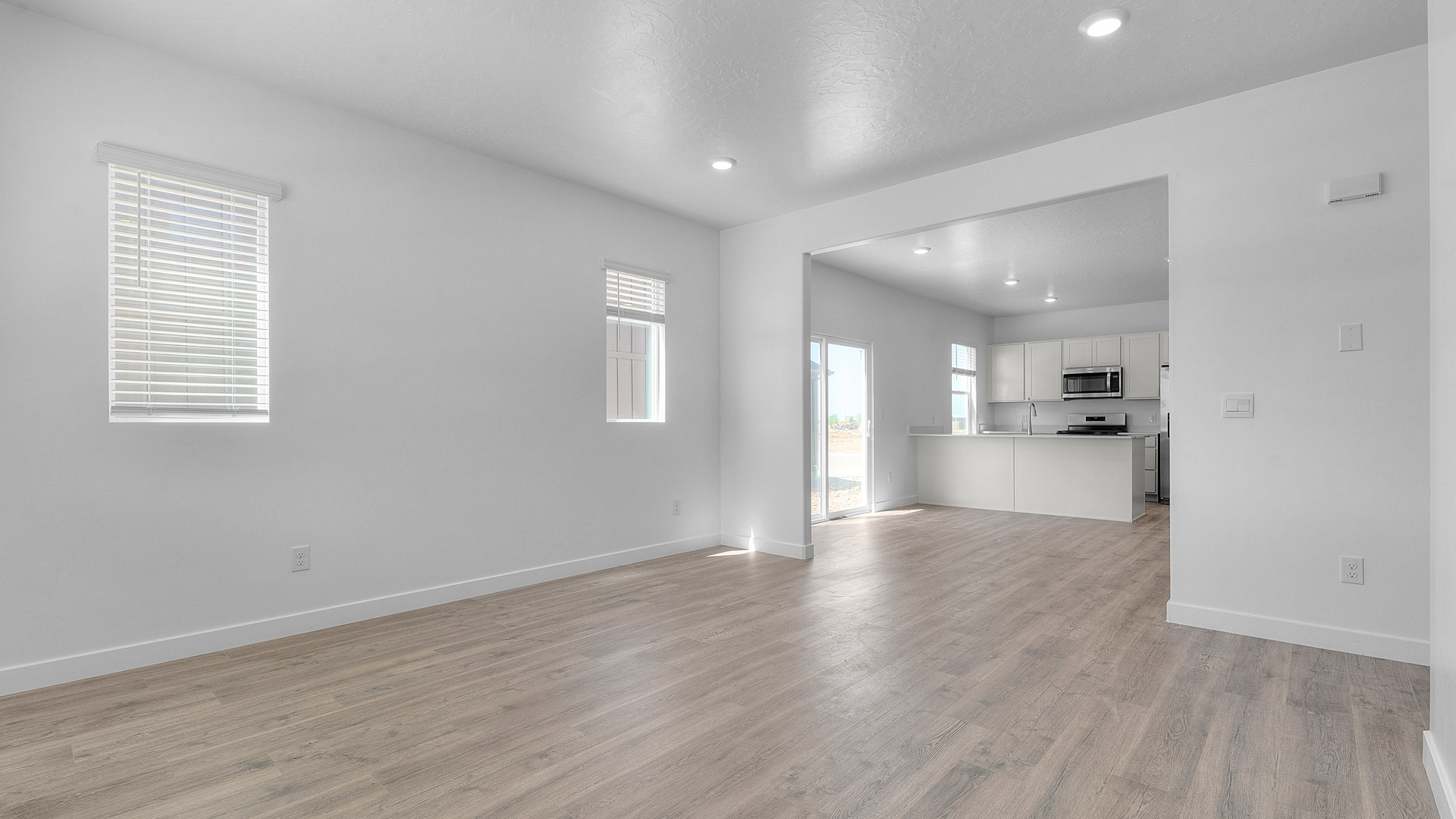 Living room featuring windows.