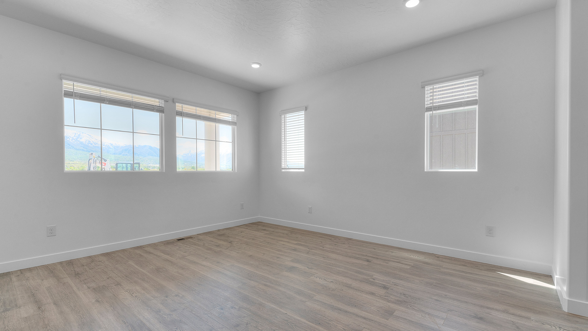 Living room featuring windows.