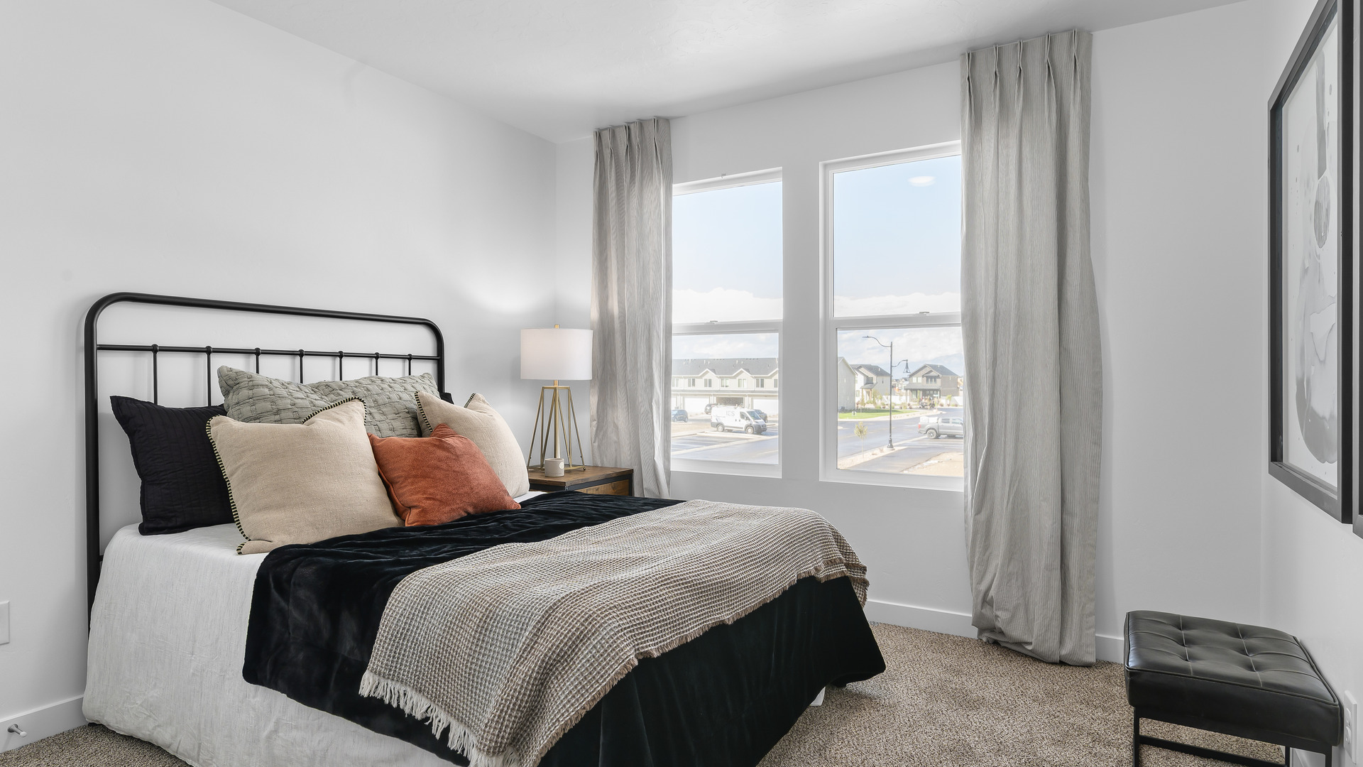 Bedroom with large window.