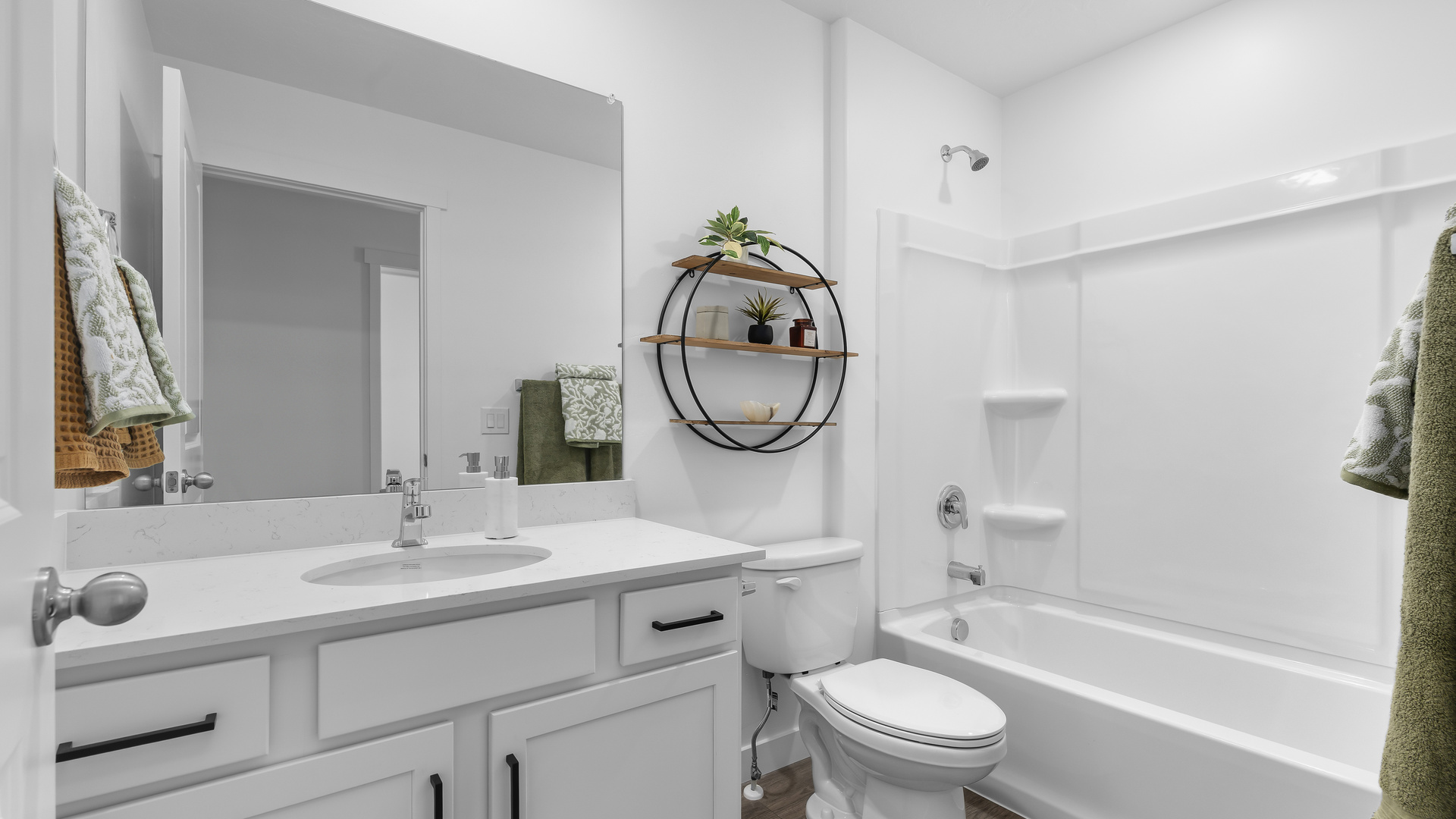Bathroom with shower surround.
