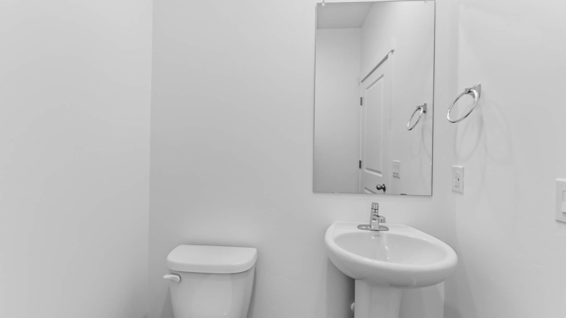 Powder bath with pedestal sink.