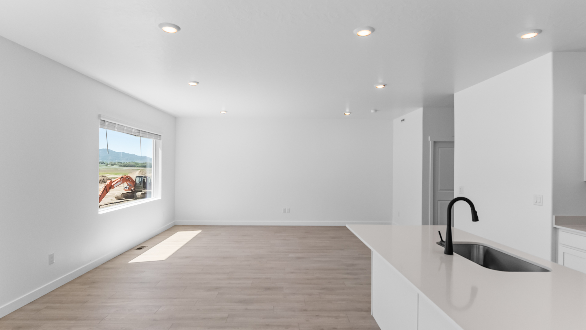 Dining room with glass patio doors.