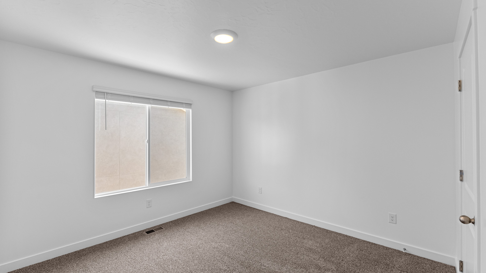 Bedroom with windows.