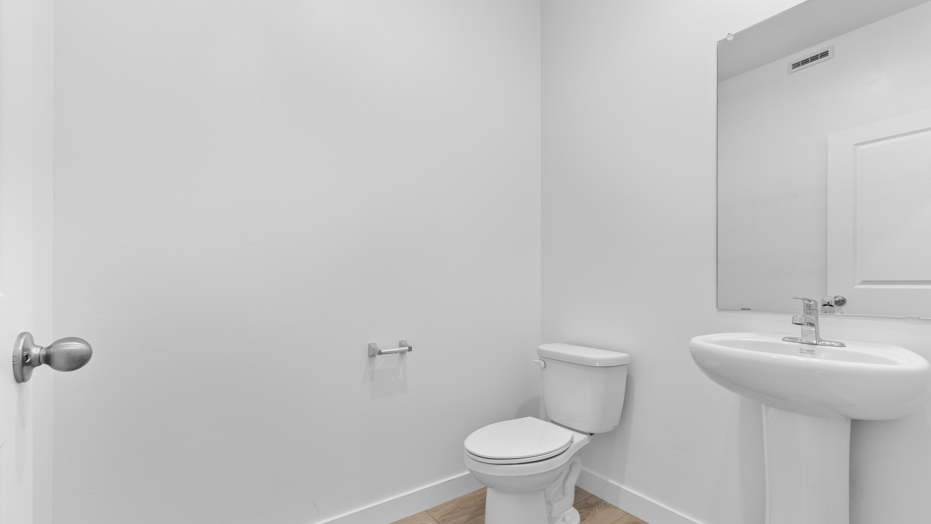 Powder bath with pedestal sink.