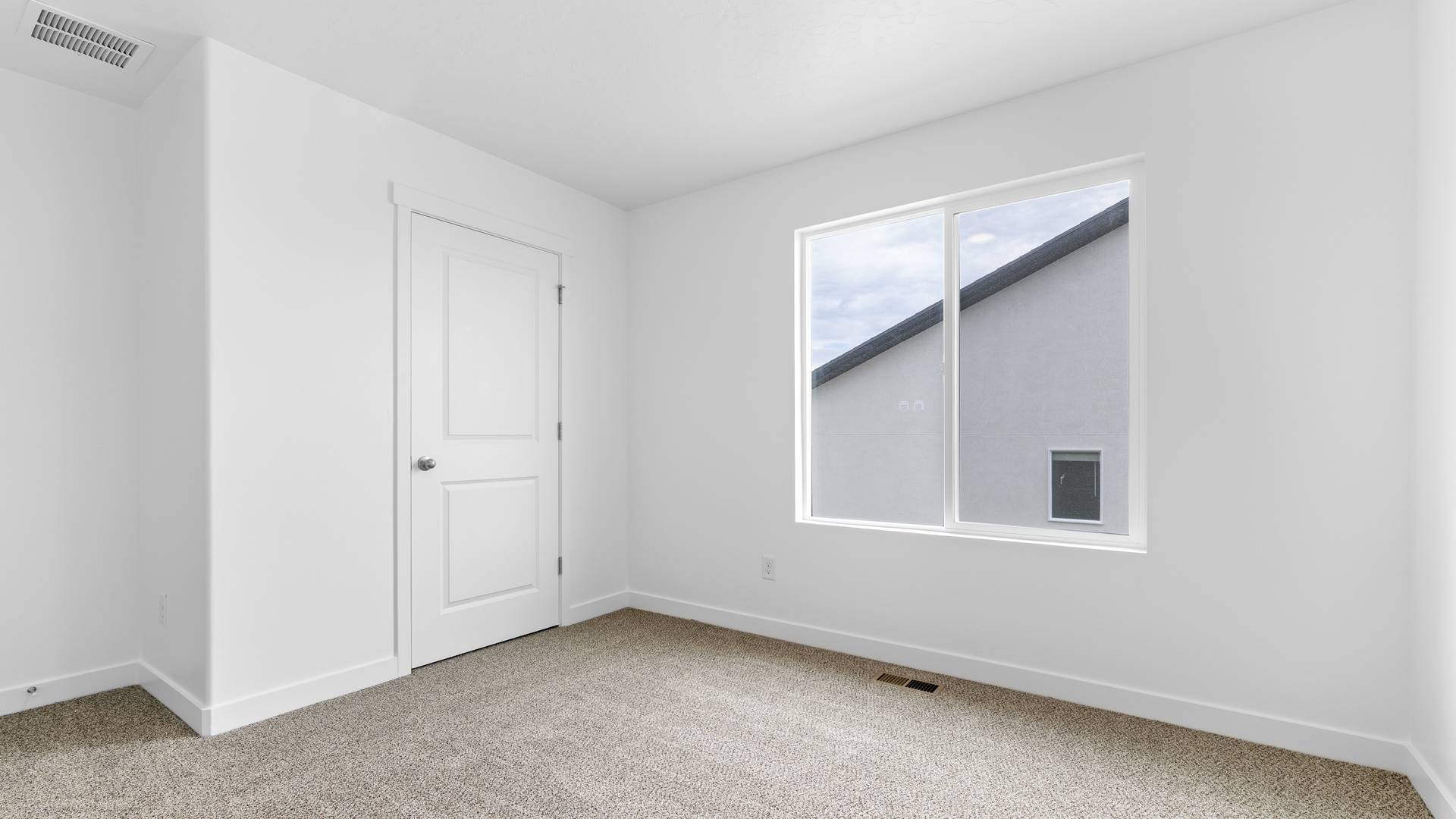 Bedroom with windows.