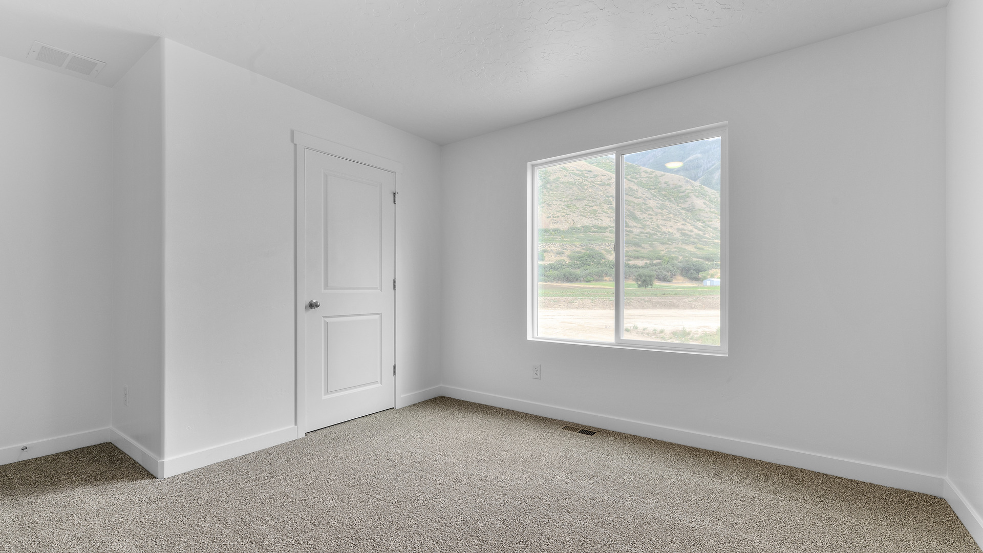Bedroom with windows.