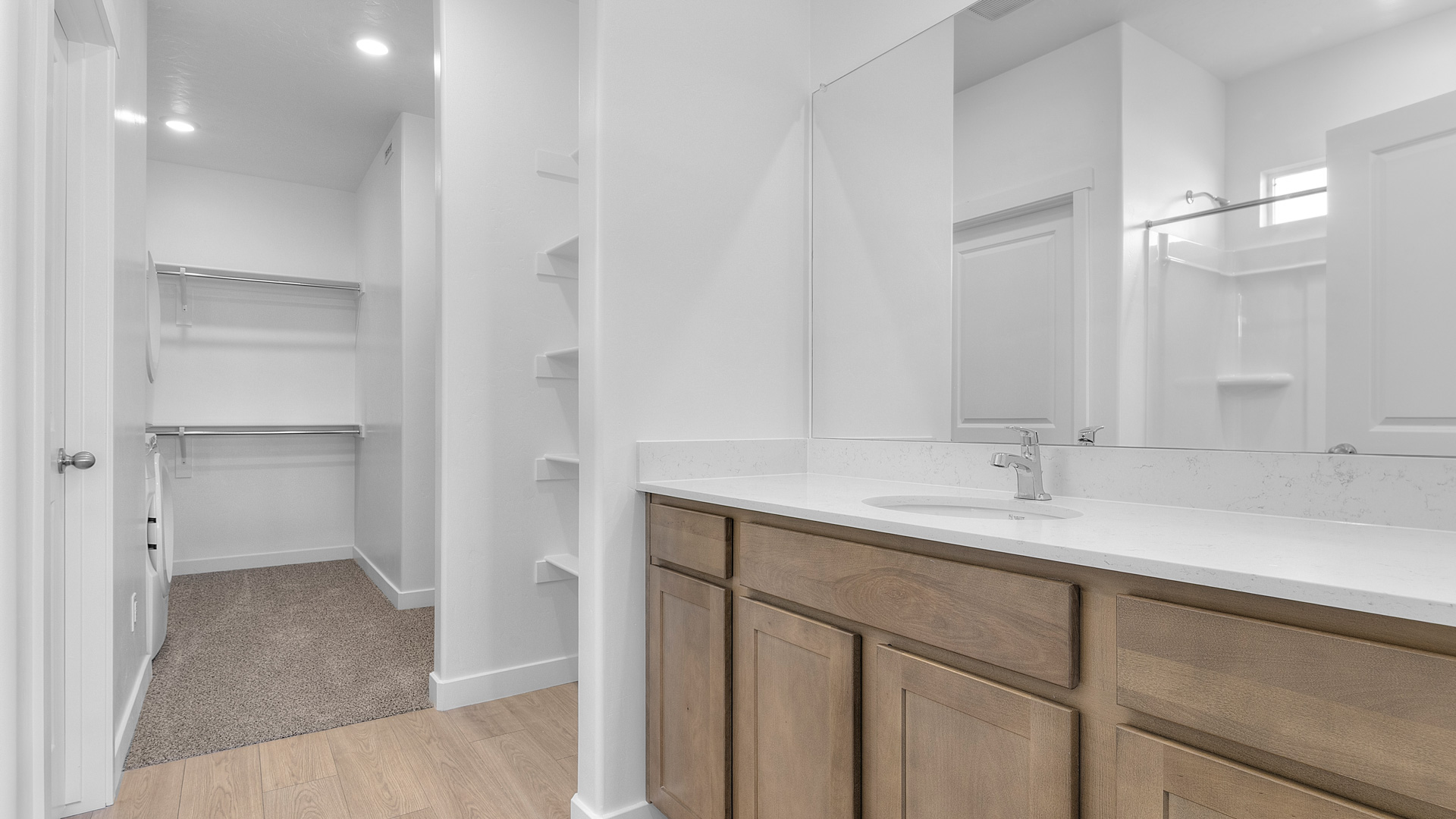 Primary bathroom with large vanity sink.