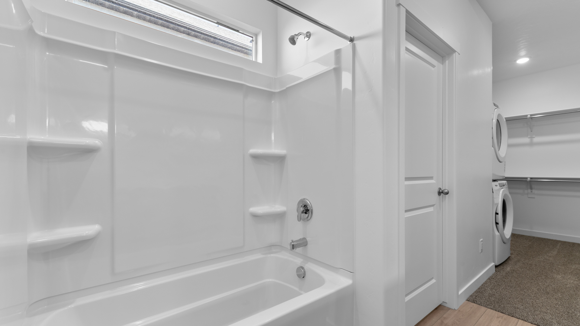 Shower surround in primary bathroom.