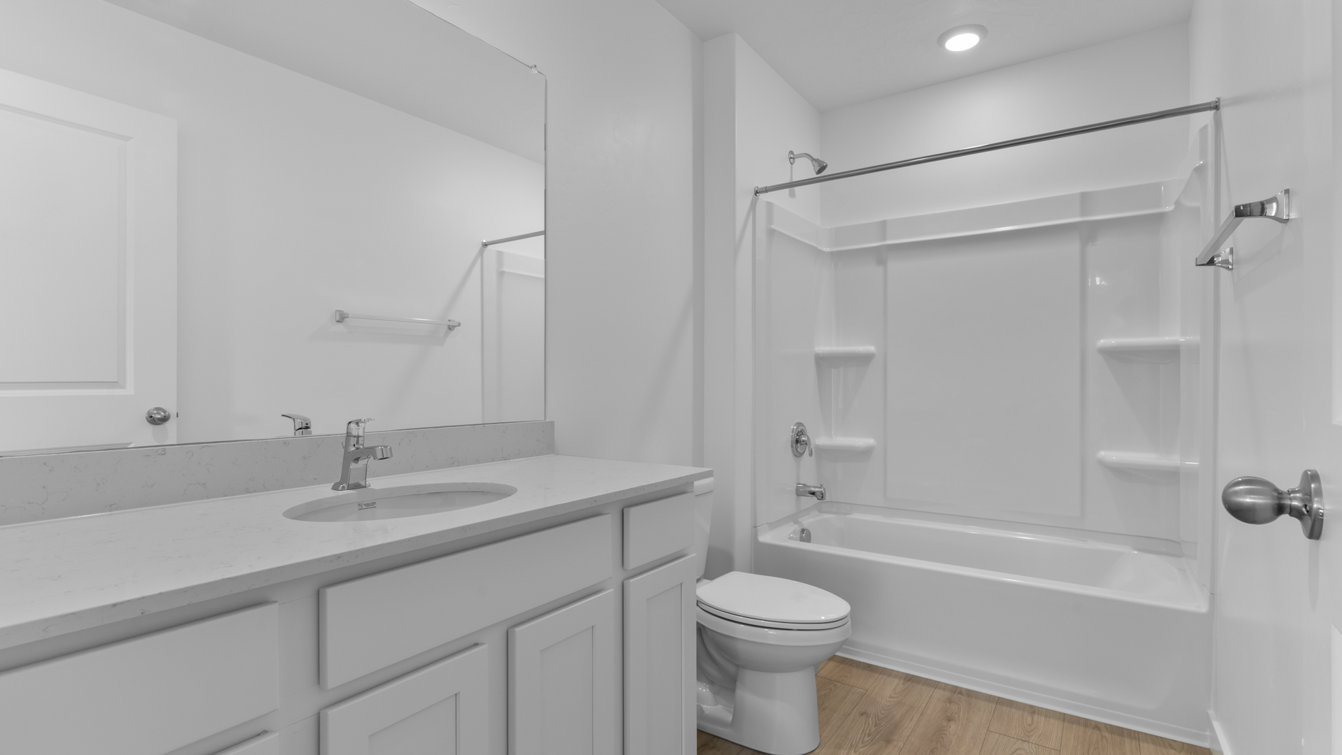 Bathroom with shower surround.