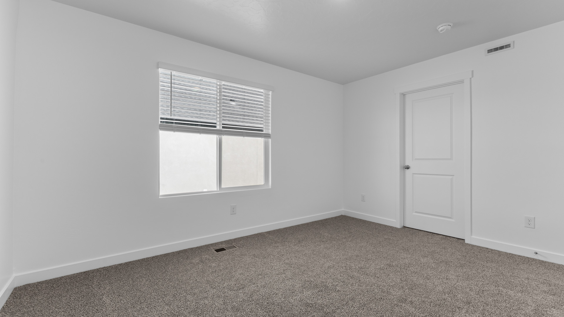 Bedroom with windows.