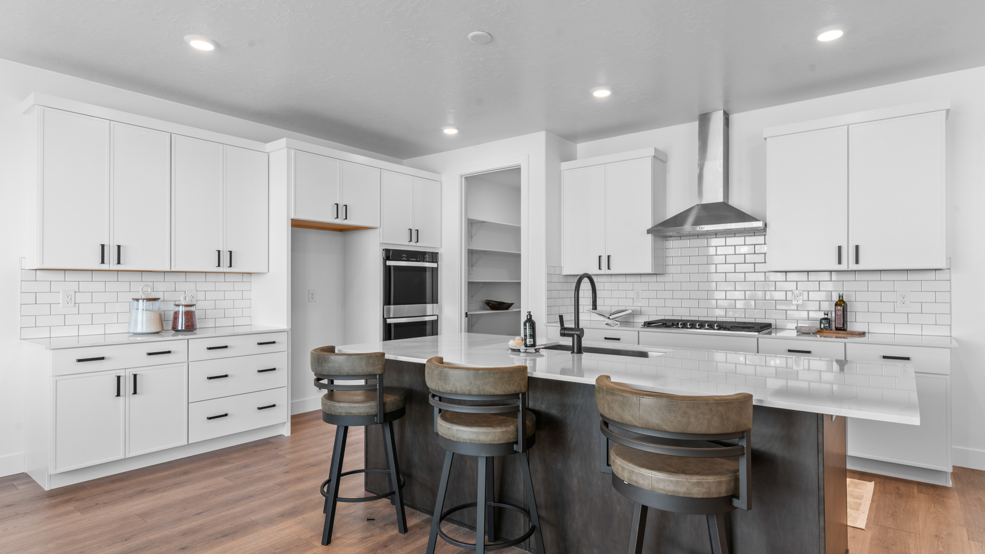 Large kitchen with kitchen island and cabinets.