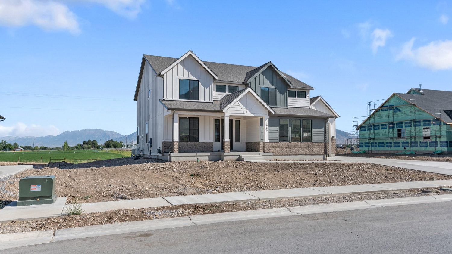 Farmhouse elevation Sutton plan in Salem Utah.
