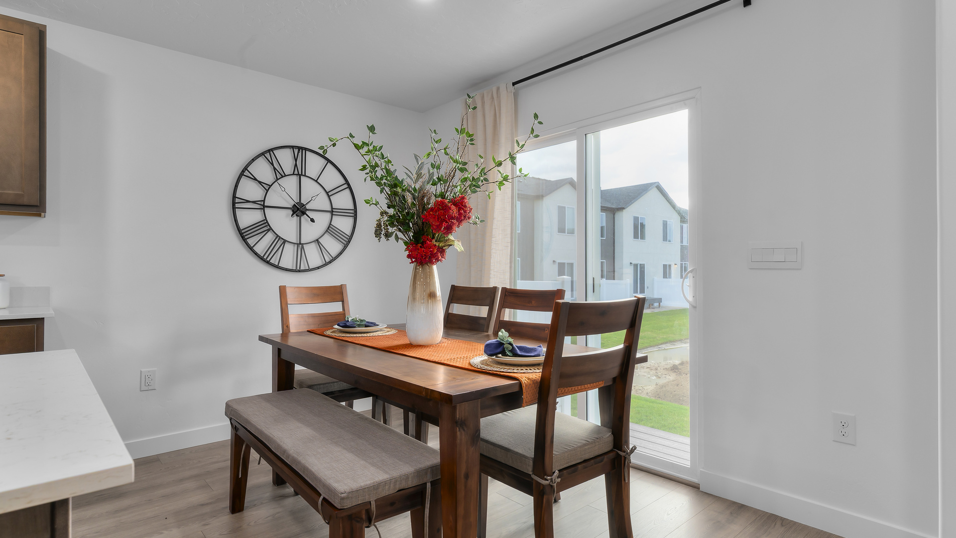 Dining area with large patio doors.