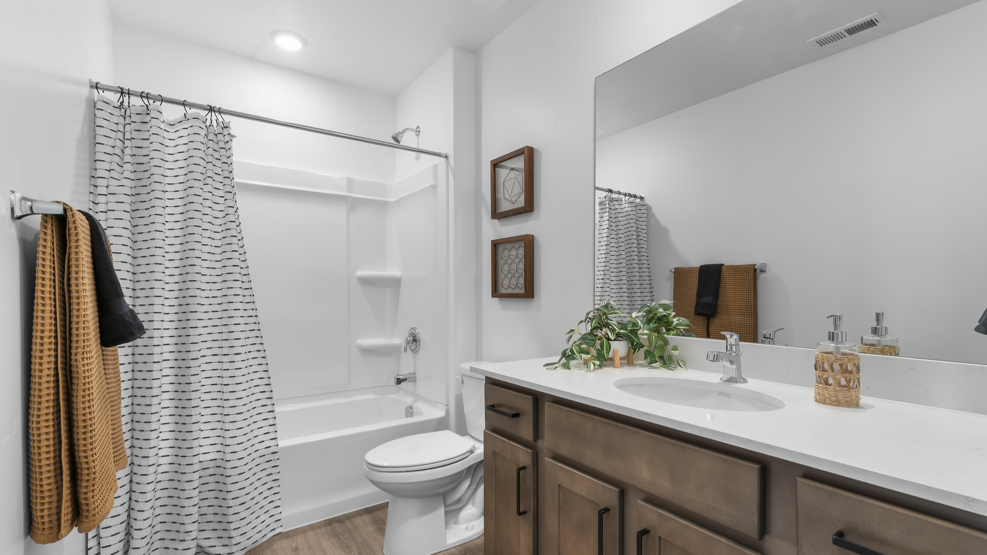 Bathroom with shower surround.