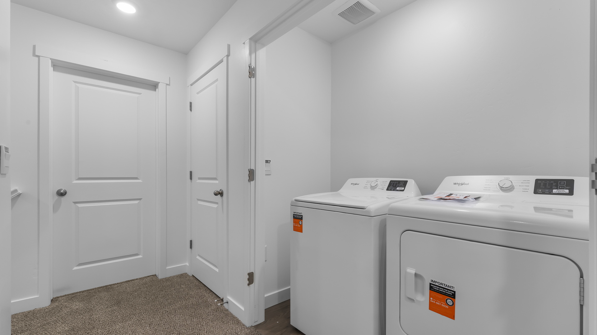 Laundry unit with doors.