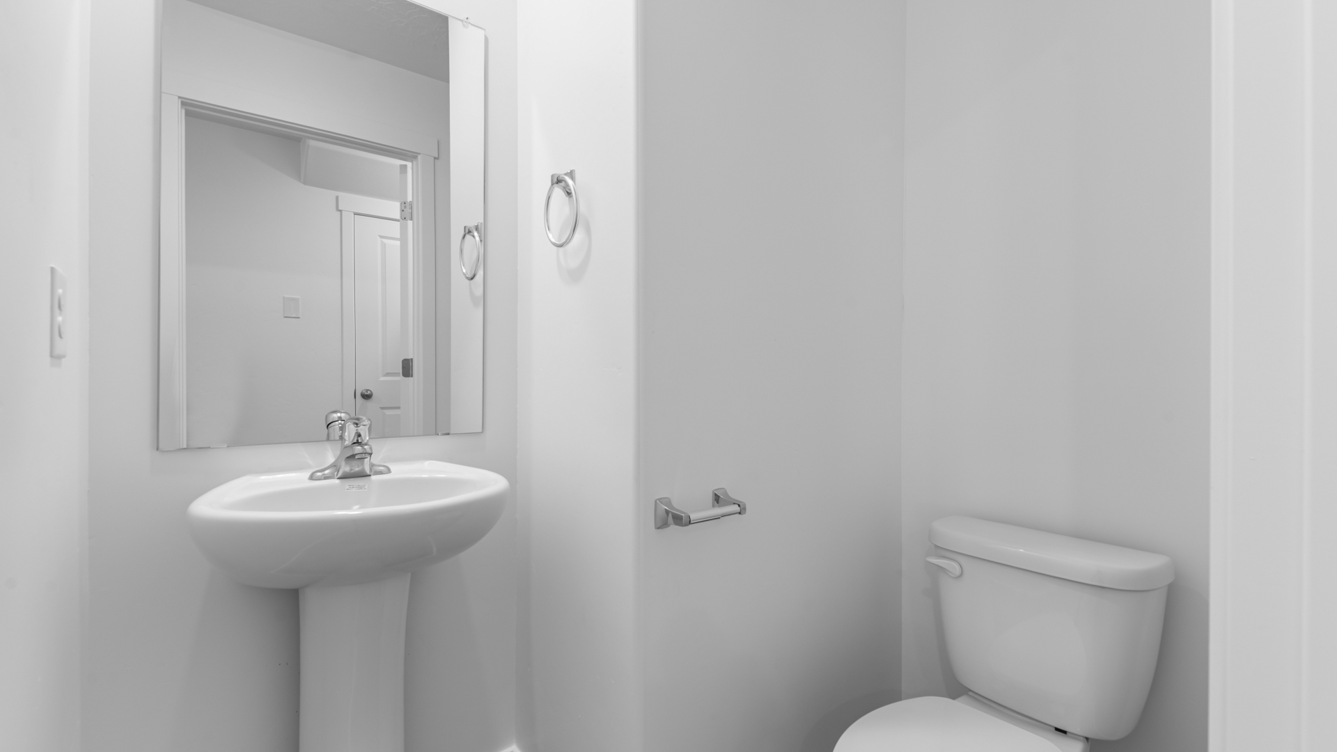 Powder bath with pedestal sink.