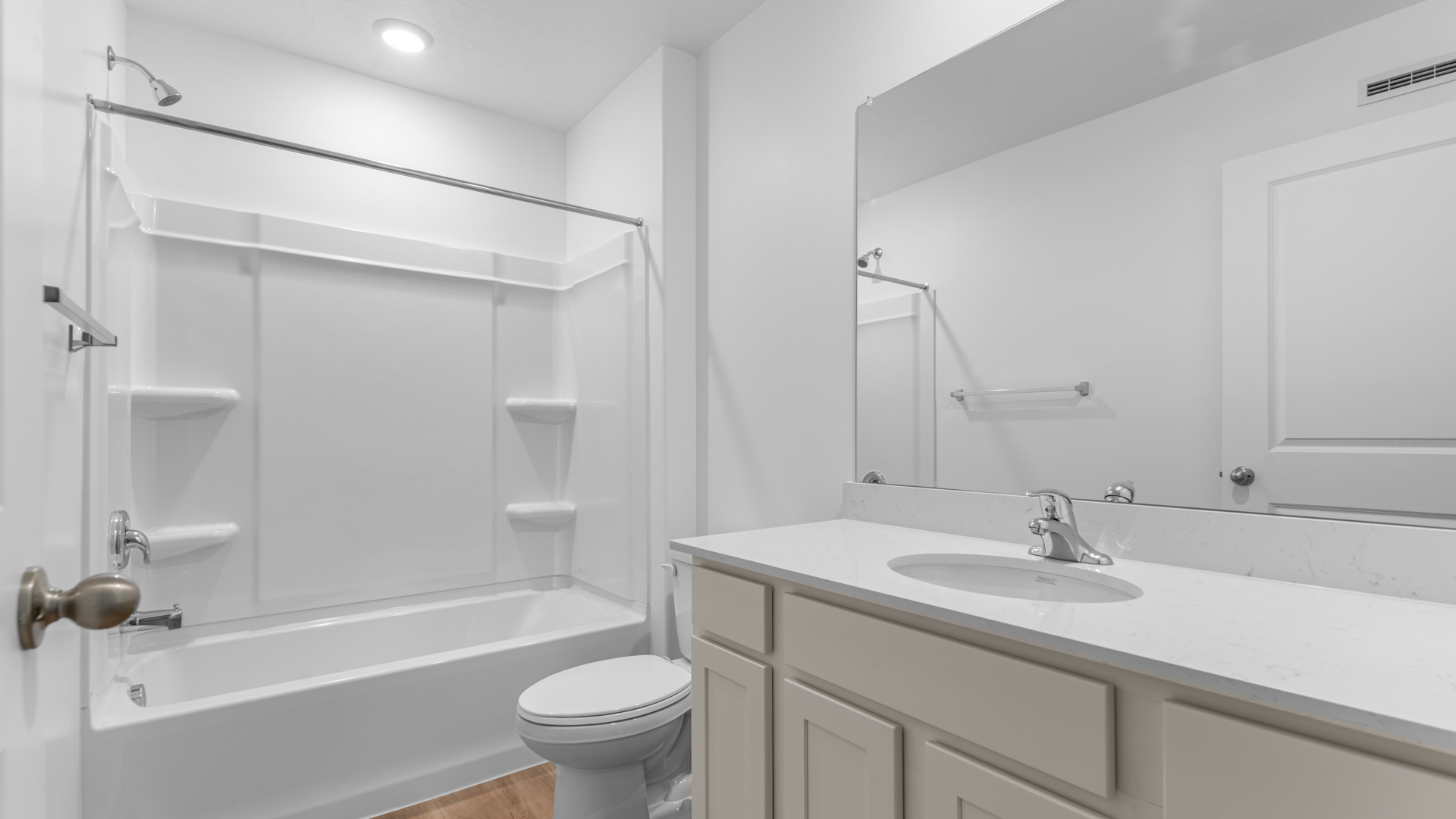 Bathroom with shower surround.