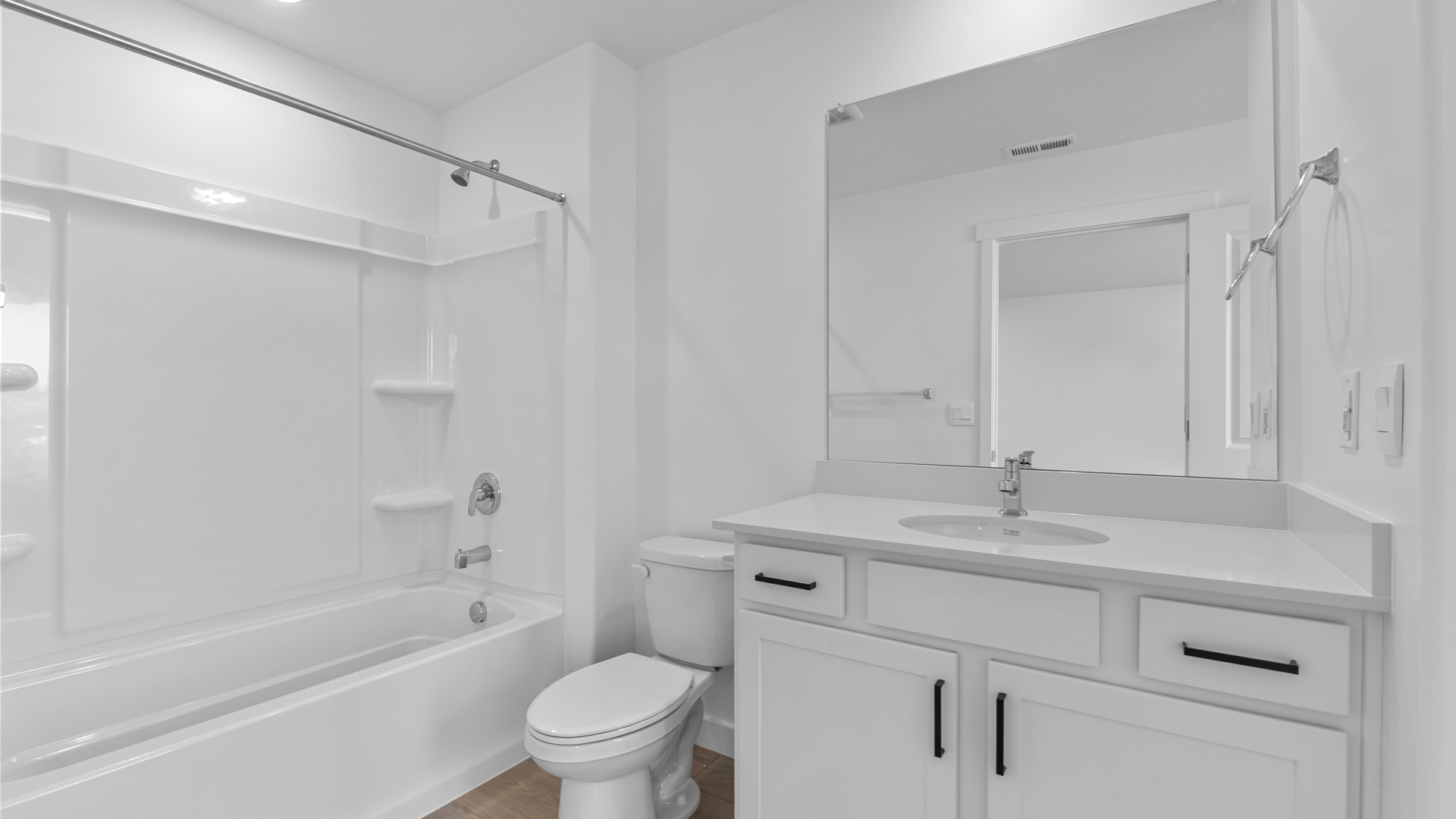 Bathrooms with vanity and shower surround